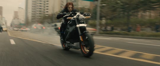 Natasha on a motorcycle