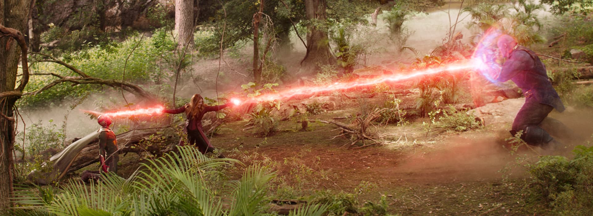 Scarlet Witch (Wanda Maximoff) fights off Thanos while helping to destroy the Vision's Mind Stone