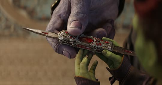 Thanos gifts Gamora a retractable bejeweled knife