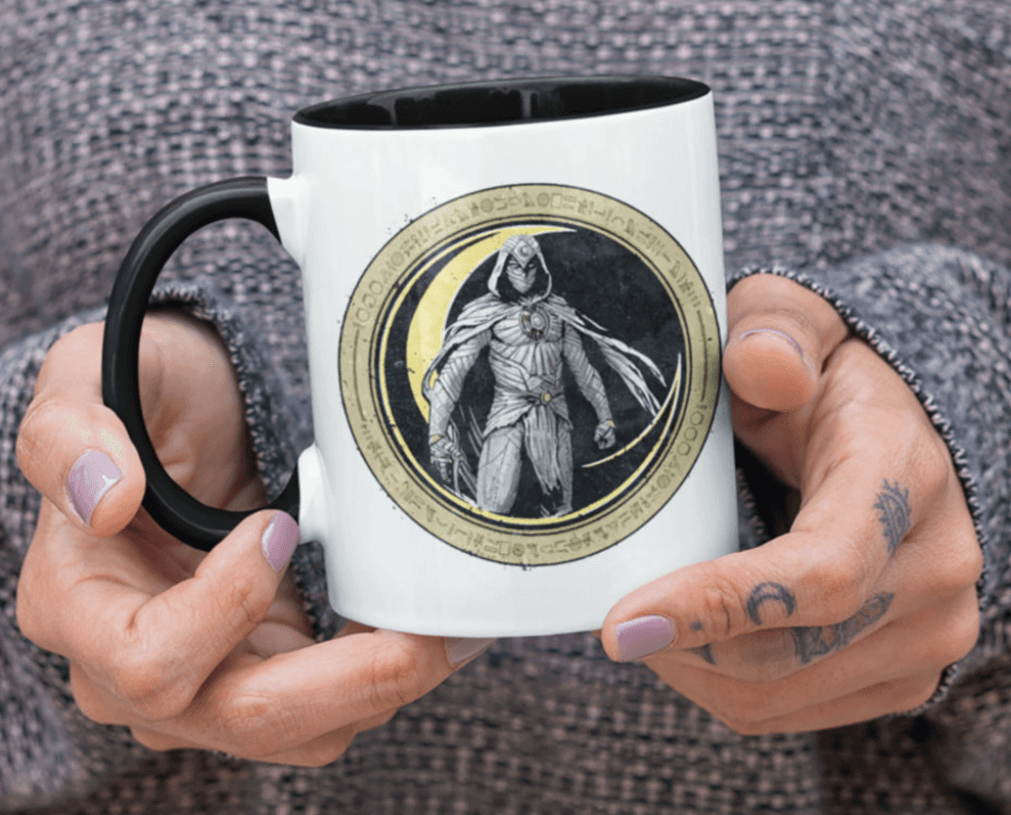 Moon Knight Crescent Moon Mug / shop it <a href=https://www.zazzle.com/moon_knight_gold_crescent_moon_character_graphic_mug-168756147597957639>here</a>
