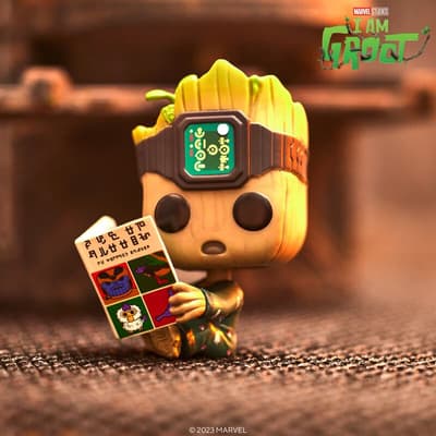 Shop it <a href=https://funko.com/pop-groot-in-onesie-with-book/70651.html>here</a>