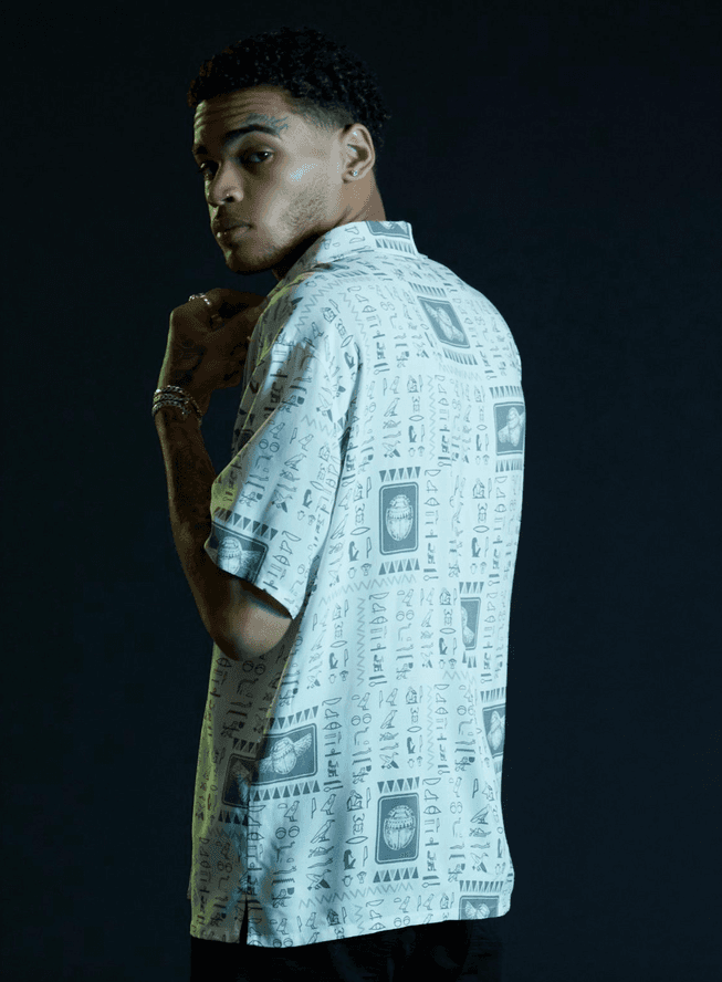 Moon Knight Scarab button up / shop it <a href=https://www.hottopic.com/product/our-universe-marvel-moon-knight-scarab-woven-button-up/17194866.html>here</a>