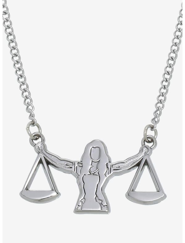 She-Hulk scale necklace / shop it <a href=    https://www.hottopic.com/product/marvel-she-hulk-attorney-at-law-justice-scale-necklace/19568490.html>here</a>