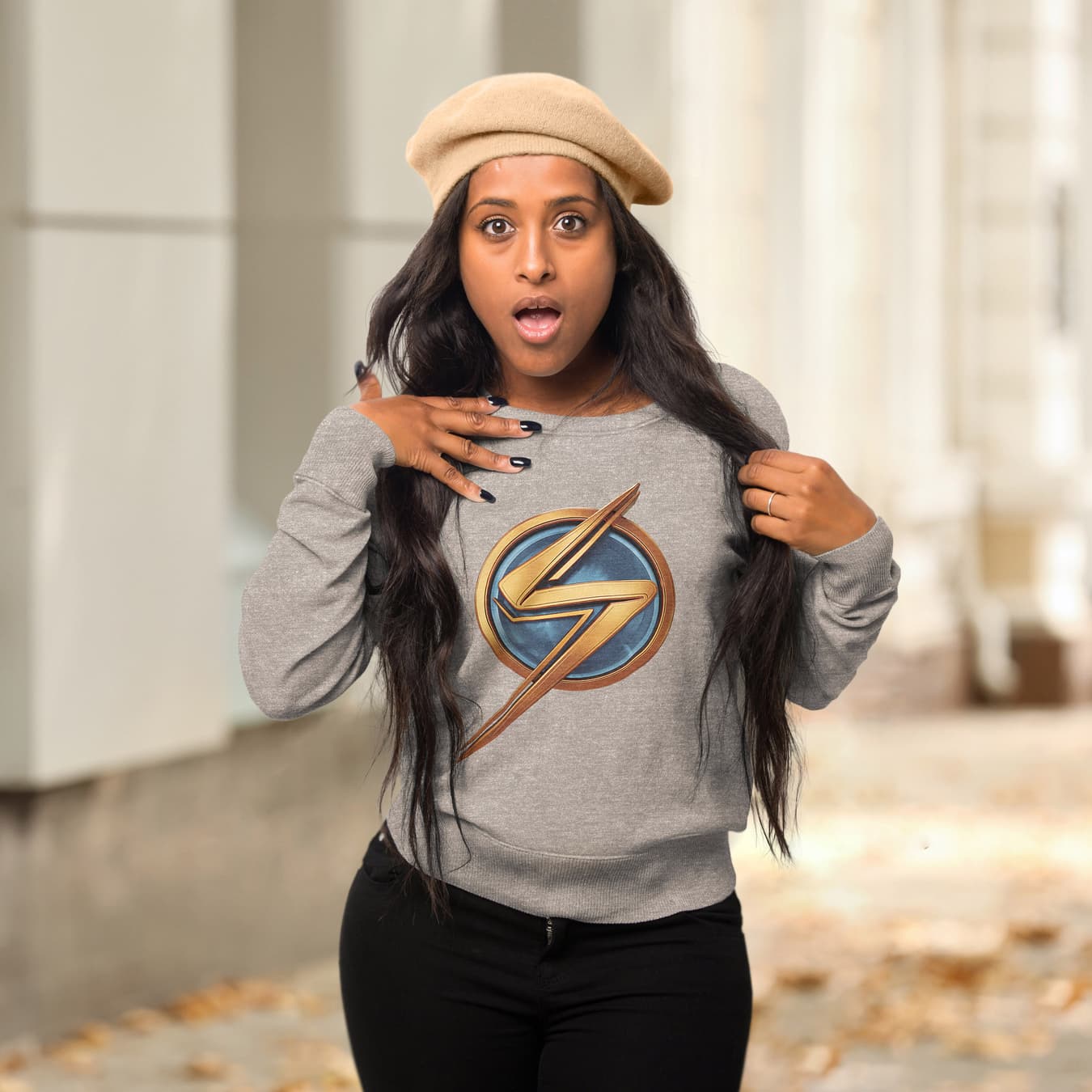 Ms. Marvel lightning bolt t-shirt / shop it <a href=https://www.amazon.com/Marvel-Lightning-Bolt-Logo-Sweatshirt/dp/B09YVWX67N>here</a>