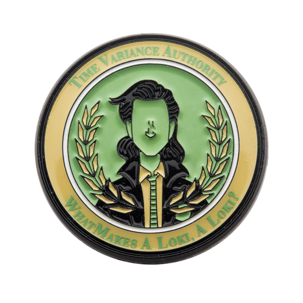 Loki TVA Pin / shop it <a href=    https://www.boxlunch.com/product/marvel-loki-time-variance-authority-enamel-pin/15228647.html>here</a>