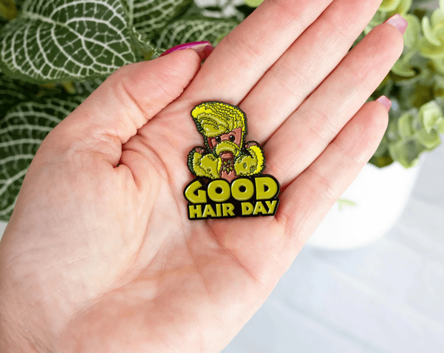 Groot ‘Hair Day’ pin / shop it <a href=https://www.toynk.com/products/marvel-studios-i-am-groot-good-hair-day-enamel-pin-toynk-exclusive?gclid=Cj0KCQjwrs2XBhDjARIsAHVymmS0Lp7Wcb3ovRhTPFknWny14kIOcBtB8pfAatcu6doUjQsmUpIexC8aAvyXEALw_wcB>here</a>