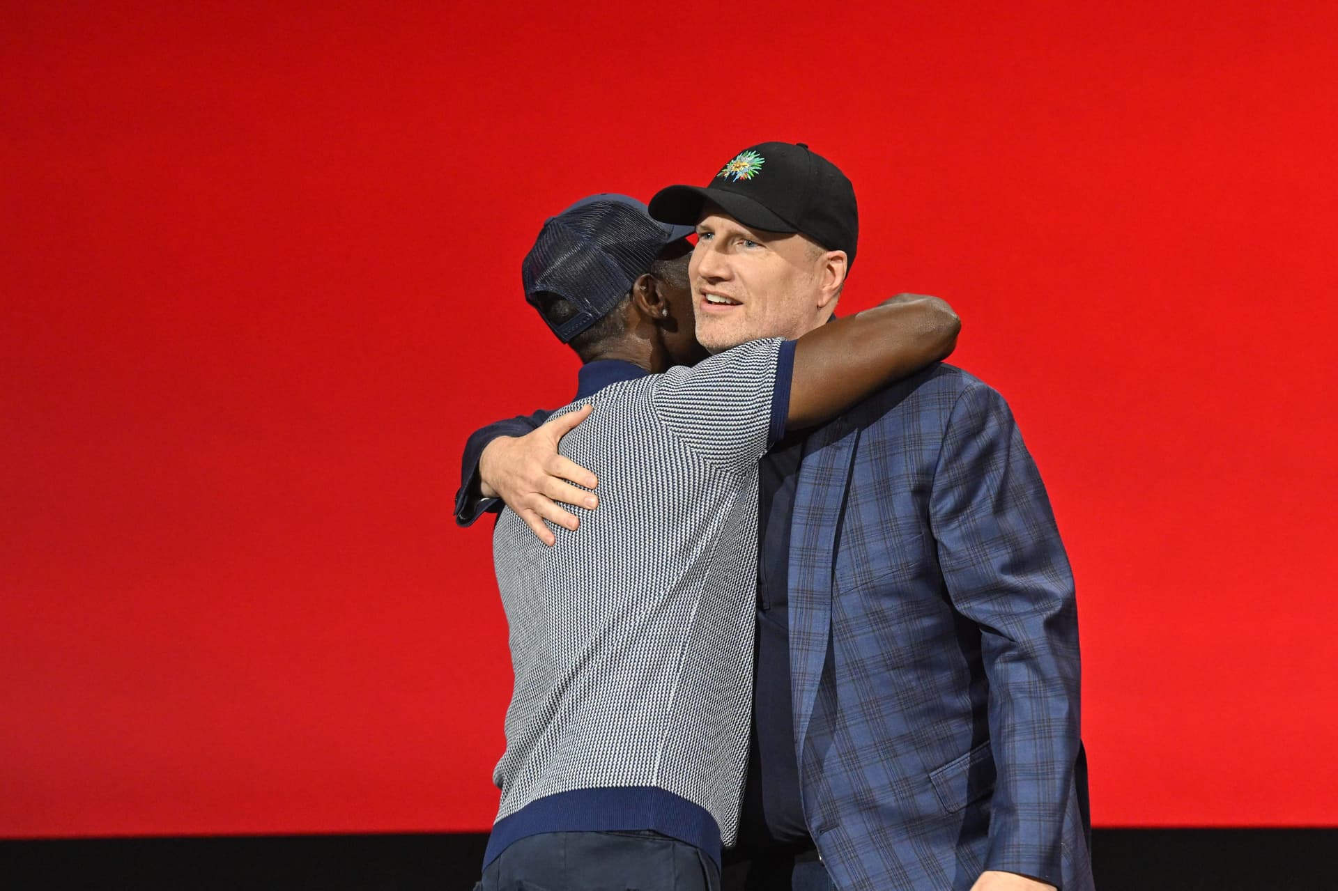 Don Cheadle and Kevin Feige during the 'Armor Wars' panel at D23