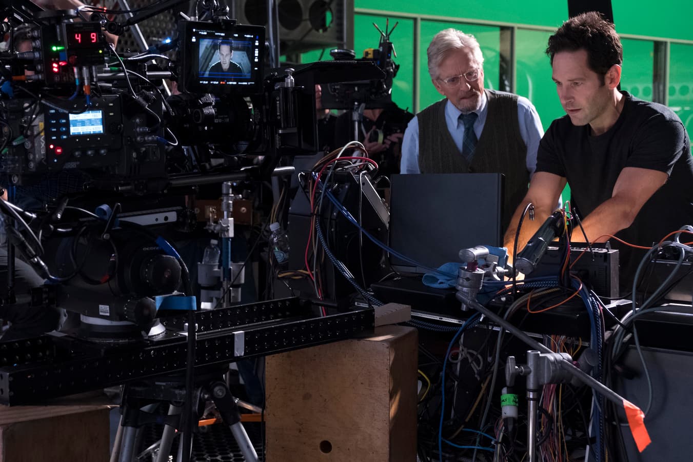 Hank Pym (Michael Douglas) and Ant-Man/Scott Lang (Paul Rudd) BTS on set.