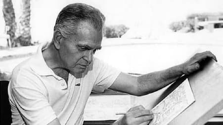Jack Kirby at work as an artist.