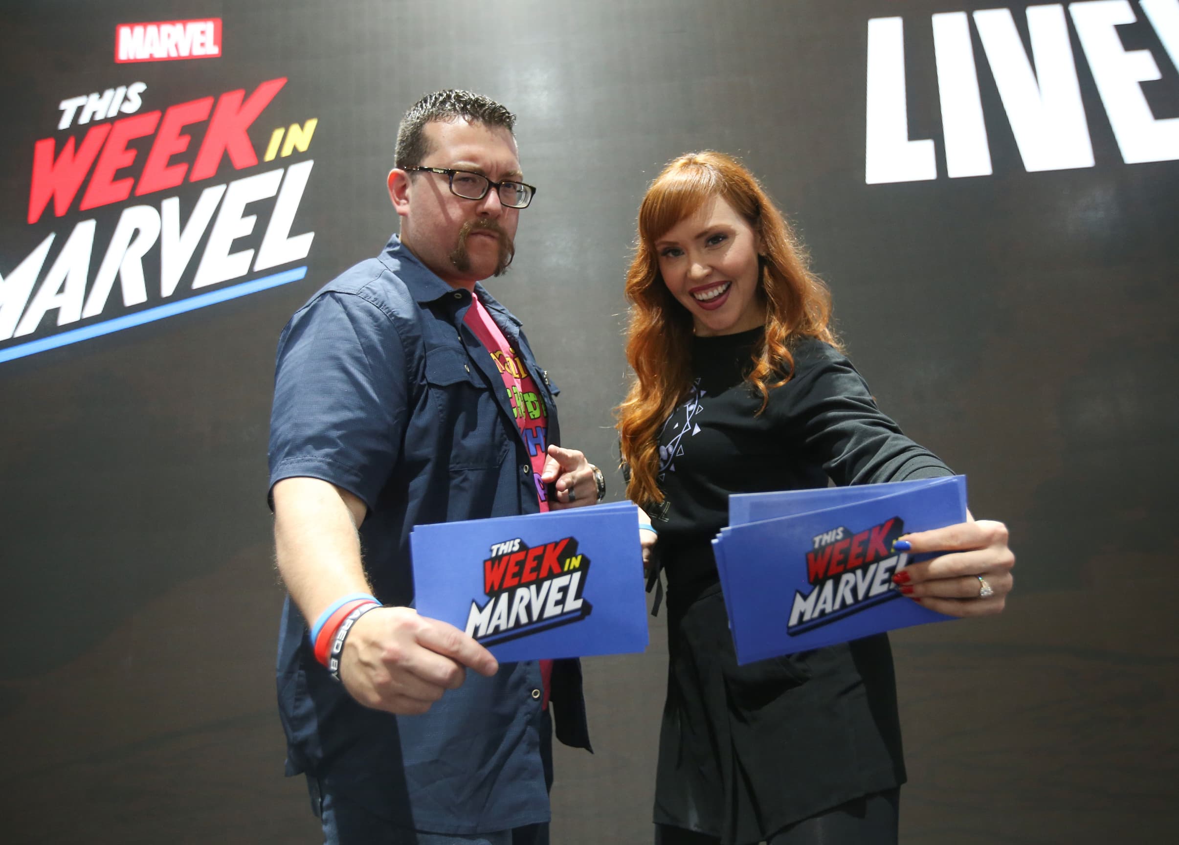 This Week in Marvel hosts Ryan "Agent M" Penagos and Lorraine Cink on stage at SDCC 2019