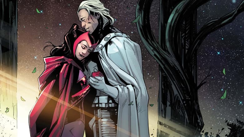Scarlet Witch and Magneto embrace.