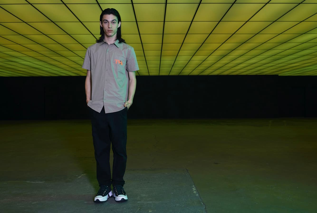 <a href=https://www.hottopic.com/product/our-universe-marvel-loki-tva-woven-button-up/15106276.html>TVA Woven Button-Up</a>/ Hot Topic