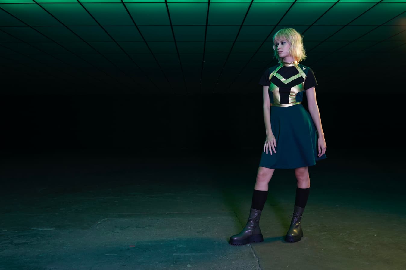 <a href=https://www.hottopic.com/product/her-universe-marvel-loki-mock-neck-mesh-inset-panel-dress/15095345.html>Loki Mock Neck Mesh Inset Panel Dress</a>/ Hot Topic