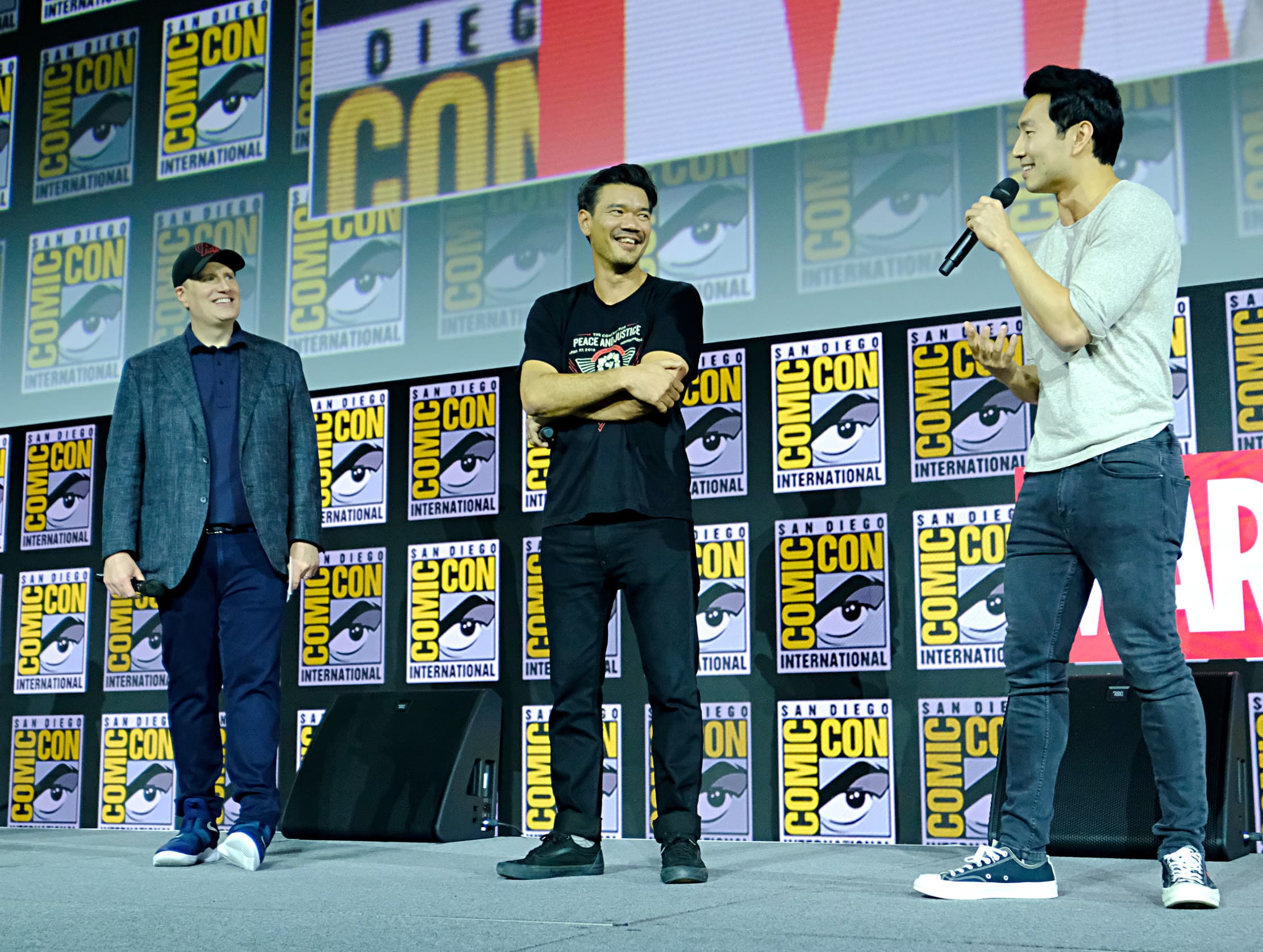 Kevin Feige, Destin Daniel Cretton, and Simu Liu