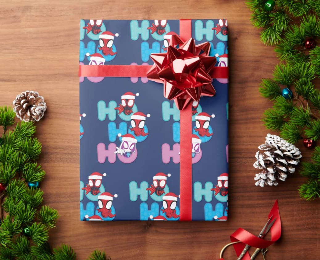 Shop it <a href=https://www.zazzle.com/team_spidey_ho_ho_ho_wrapping_paper-256505074083333285>here</a>