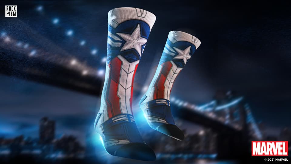 <a href=https://rockemsocks.com/collections/the-falcon-and-the-winter-soldier/products/captain-america-sam-wilson-hypersuit>Captain America: HyperSuit</a> / Rock ‘Em Socks