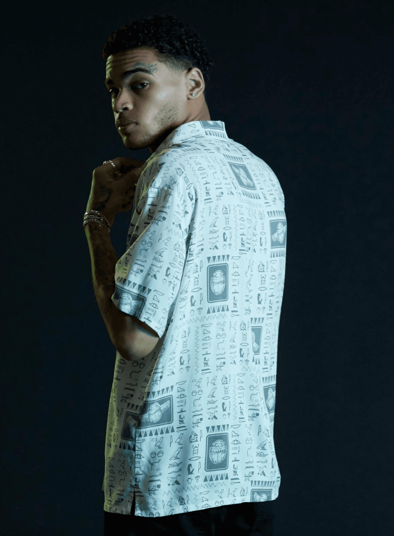 Moon Knight Scarab button up / shop it <a href=https://www.hottopic.com/product/our-universe-marvel-moon-knight-scarab-woven-button-up/17194866.html>here</a>