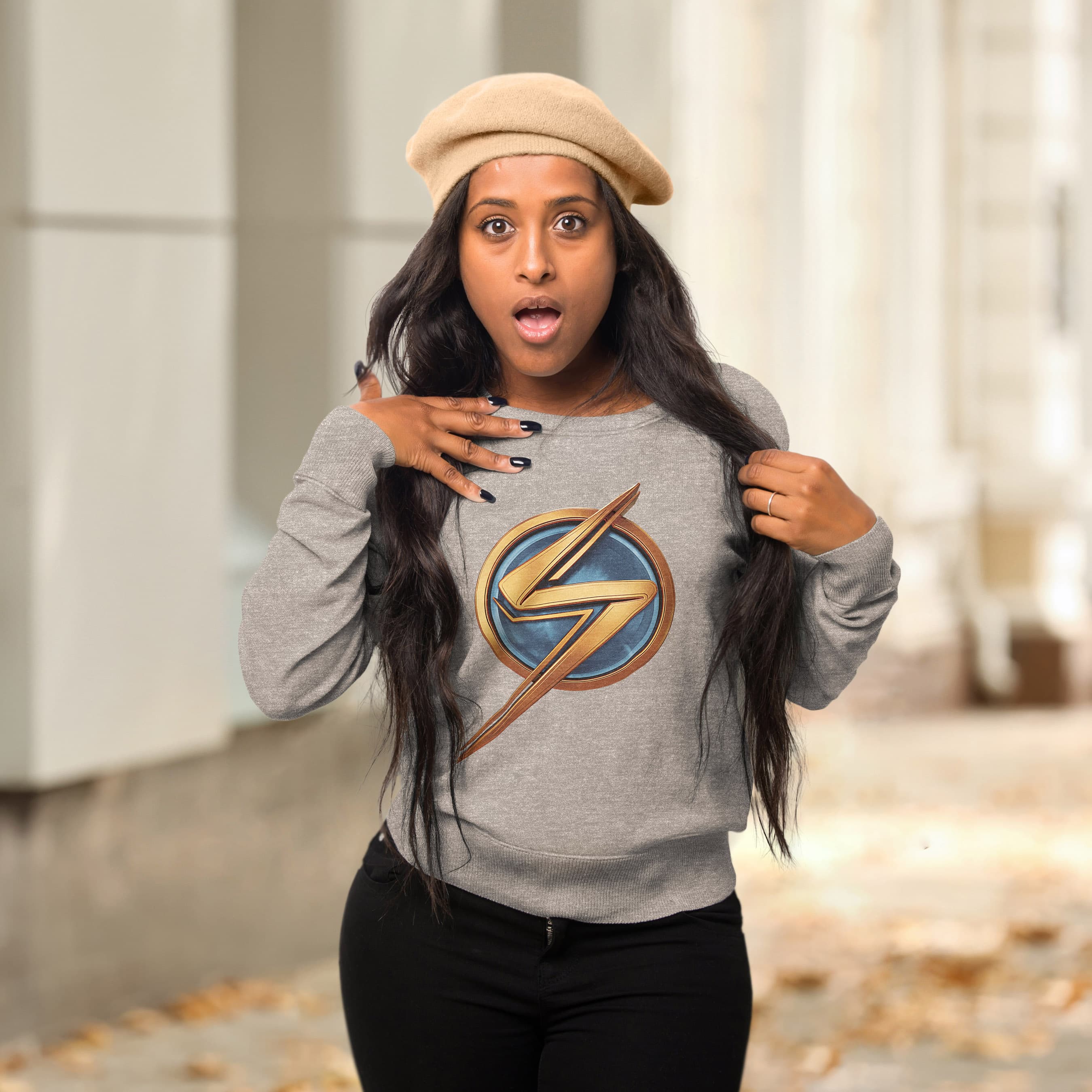 Ms. Marvel lightning bolt t-shirt / shop it <a href=https://www.amazon.com/Marvel-Lightning-Bolt-Logo-Sweatshirt/dp/B09YVWX67N>here</a>