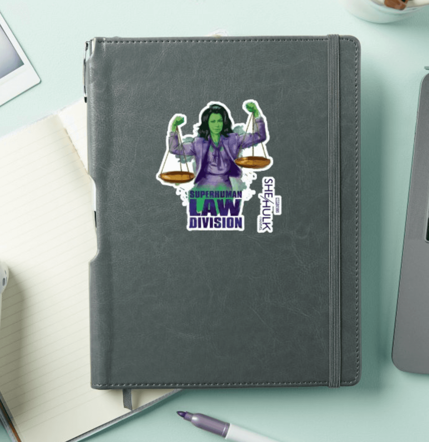 She-Hulk sticker / shop it <a href=    https://www.zazzle.com/she_hulk_scales_of_justice_superhuman_law_division_sticker-256721287332719244>here</a>