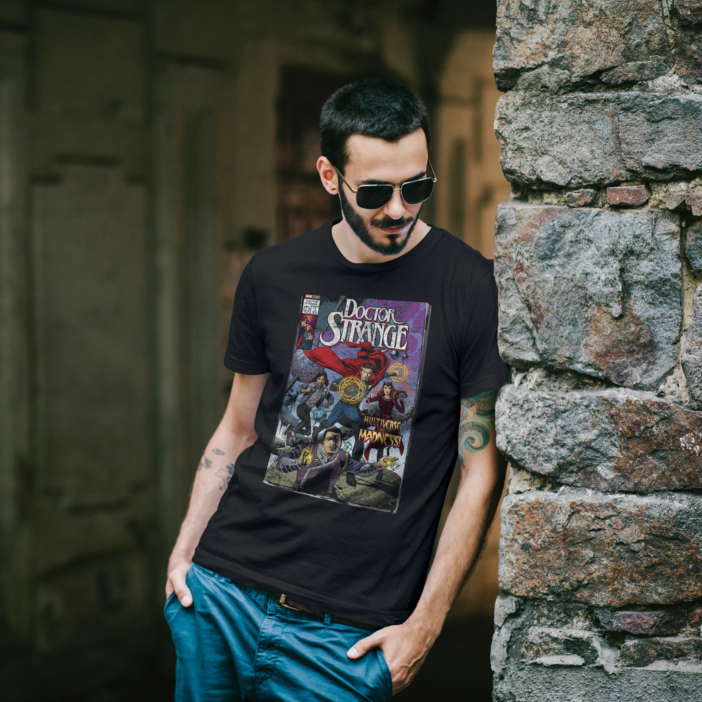 Multiverse of Madness Comic t-shirt / shop it <a href=https://www.amazon.com/Marvel-Strange-Multiverse-Madness-T-Shirt/dp/B09SKR376Z>here</a>