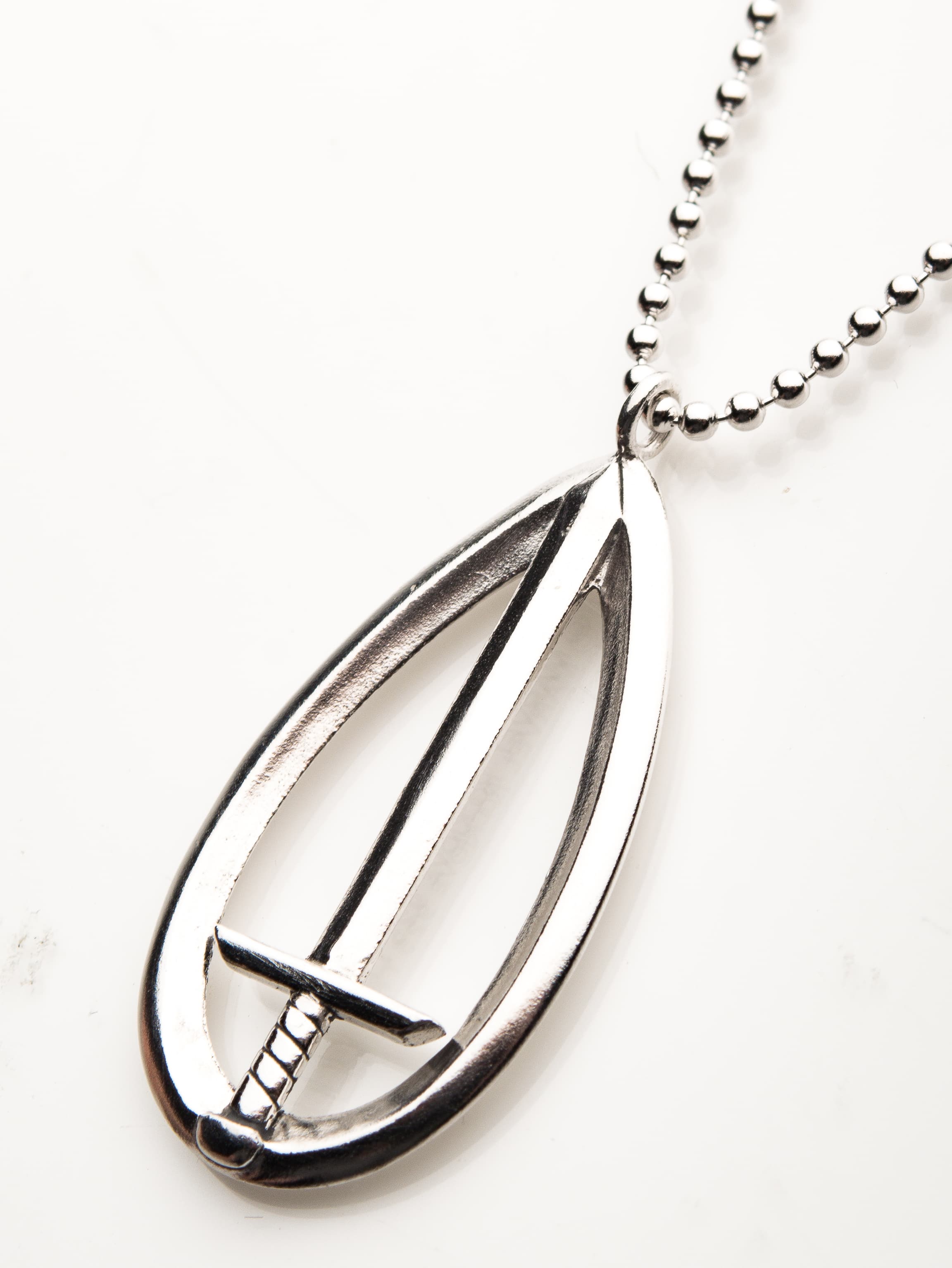 <a href="https://www.rocklove.com/products/marvel-wandavision-sword-necklace">S.W.O.R.D. Necklace</a> / RockLove