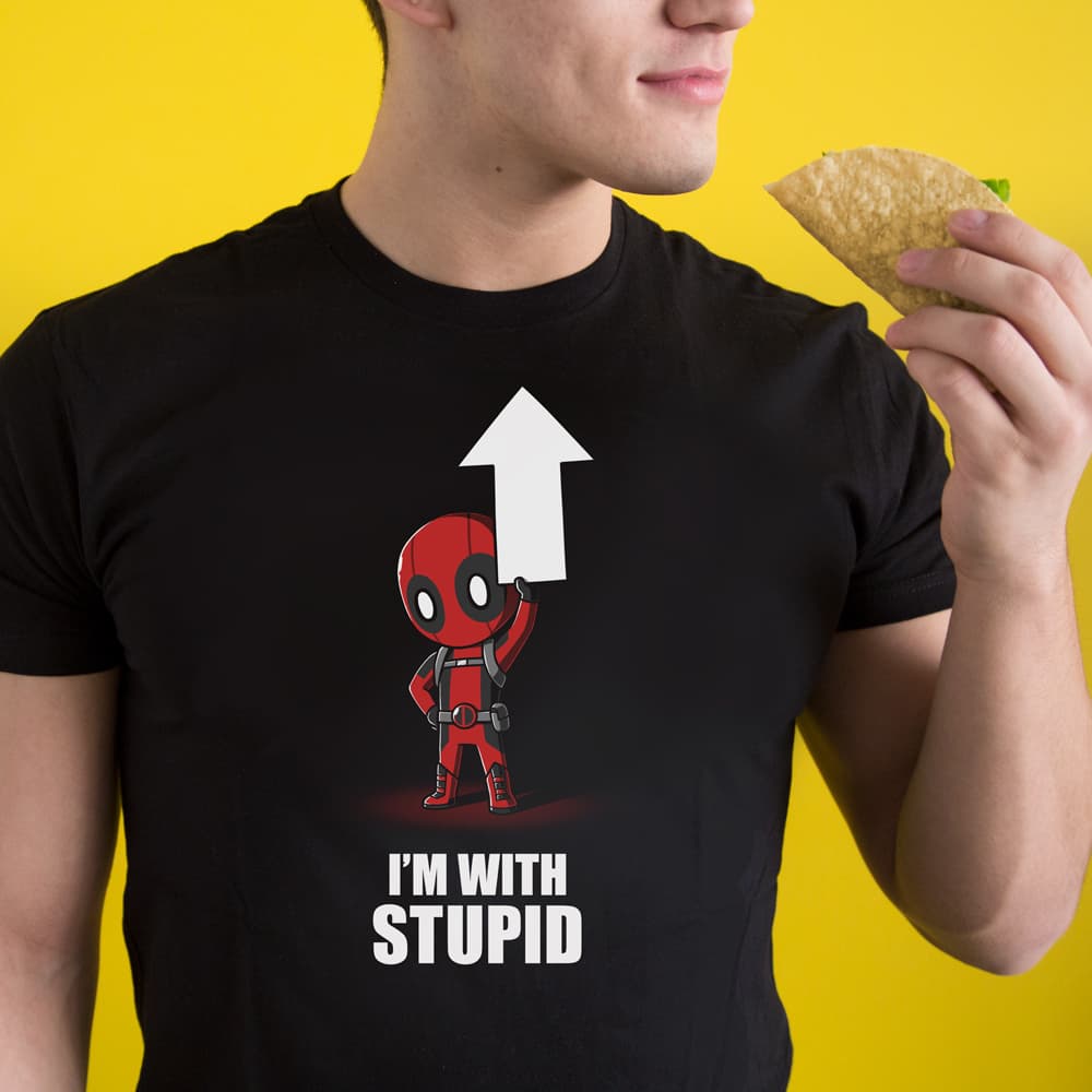 <a href="https://fandoms.teeturtle.com/products/im-with-stupid?variant=8764266250294"> Deadpool I'm With Stupid Tee</a> / Tee Turtle