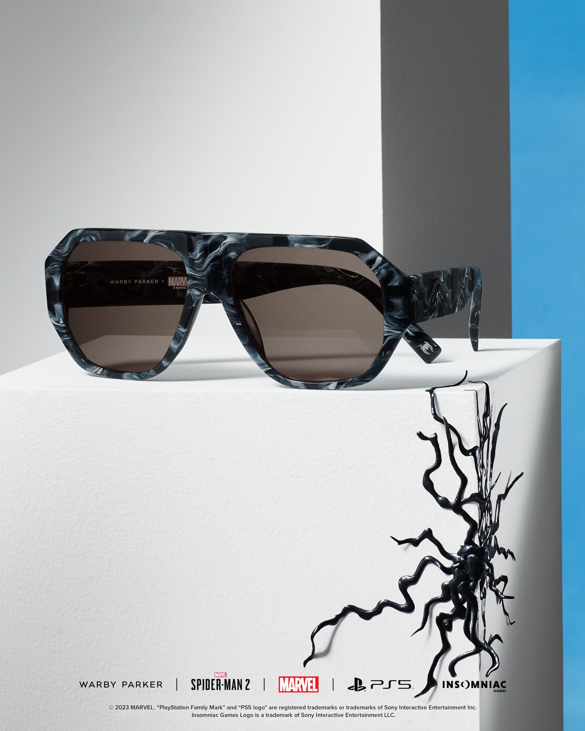 Shop it <a href=https://www.warbyparker.com/sunglasses/venom/fog?&utm_source=Marvel&utm_medium=referral&utm_campaign=MarvelSpiderMan2&utm_content=GiftGuide-Venom>here</a>