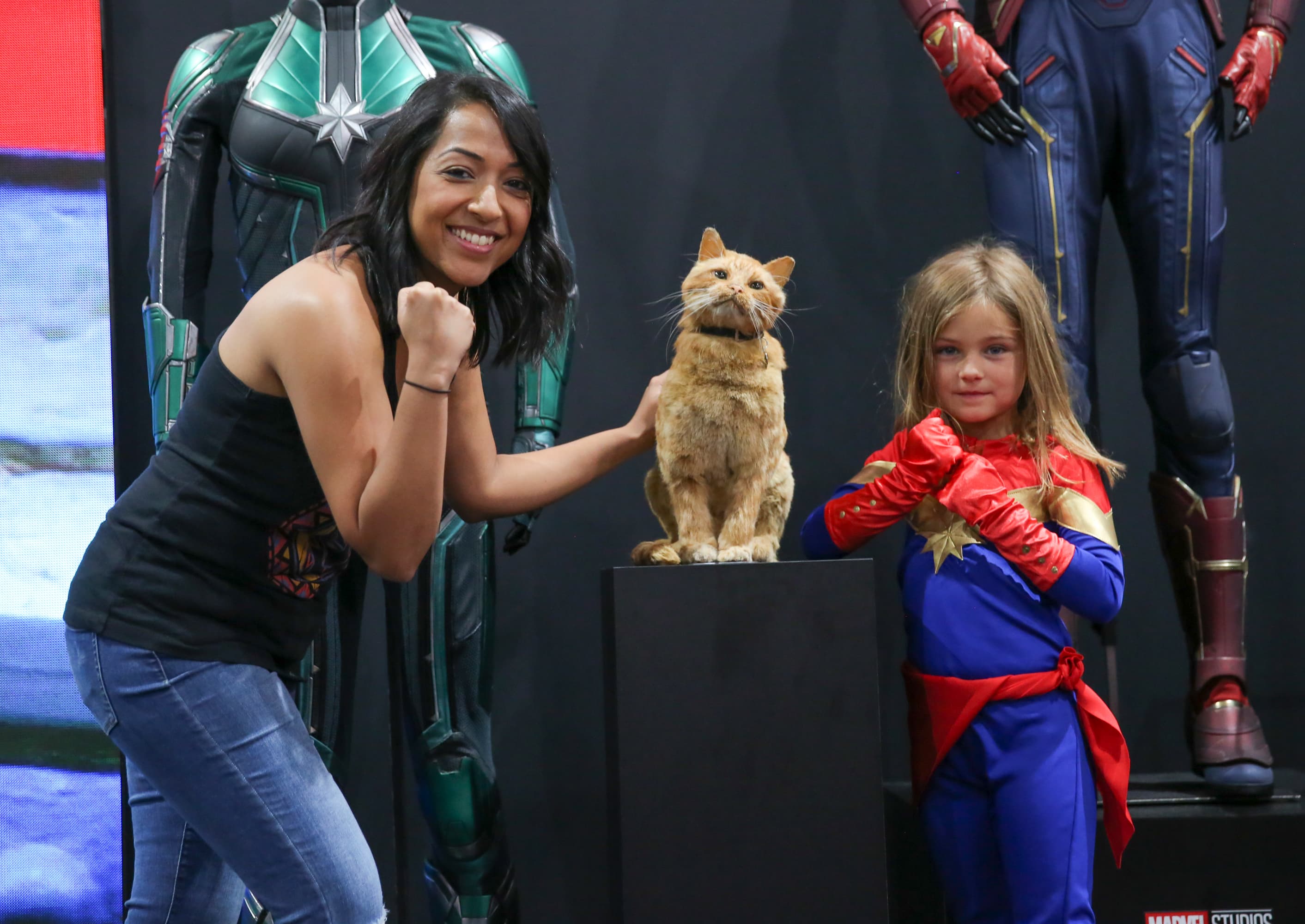 Marvel VP, Content & Character Development Sana Amanat poses with a young Captain Marvel fan (and Goose the Cat)