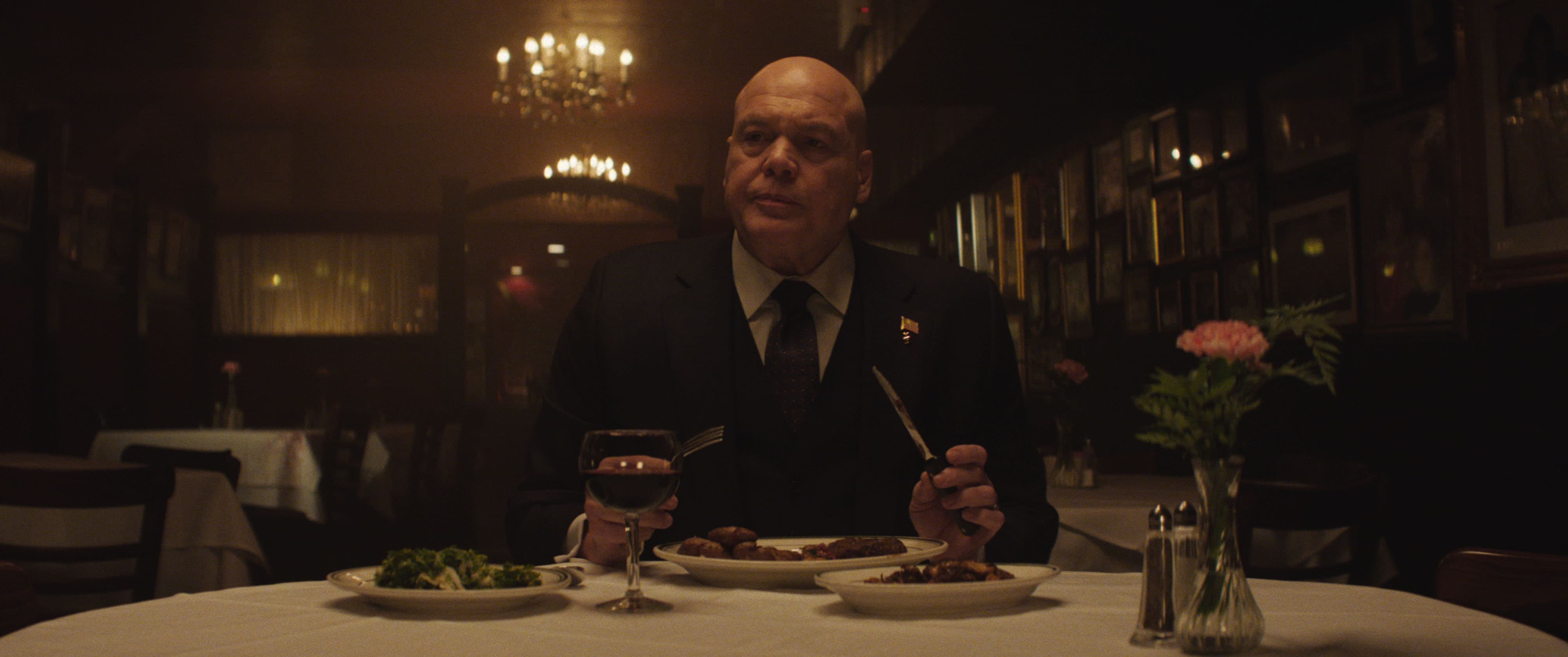 'Daredevil: Born Again' still of Wilson Fisk eating dinner