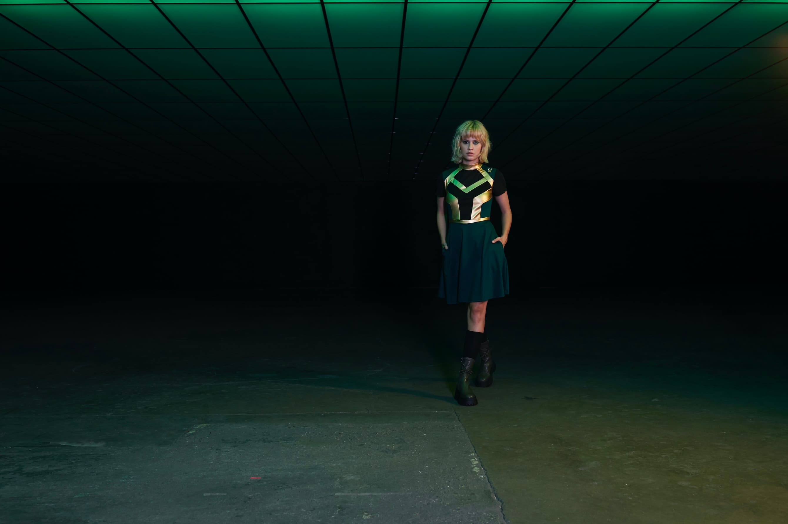 <a href=https://www.hottopic.com/product/her-universe-marvel-loki-mock-neck-mesh-inset-panel-dress/15095345.html>Loki Mock Neck Mesh Inset Panel Dress</a>/ Hot Topic