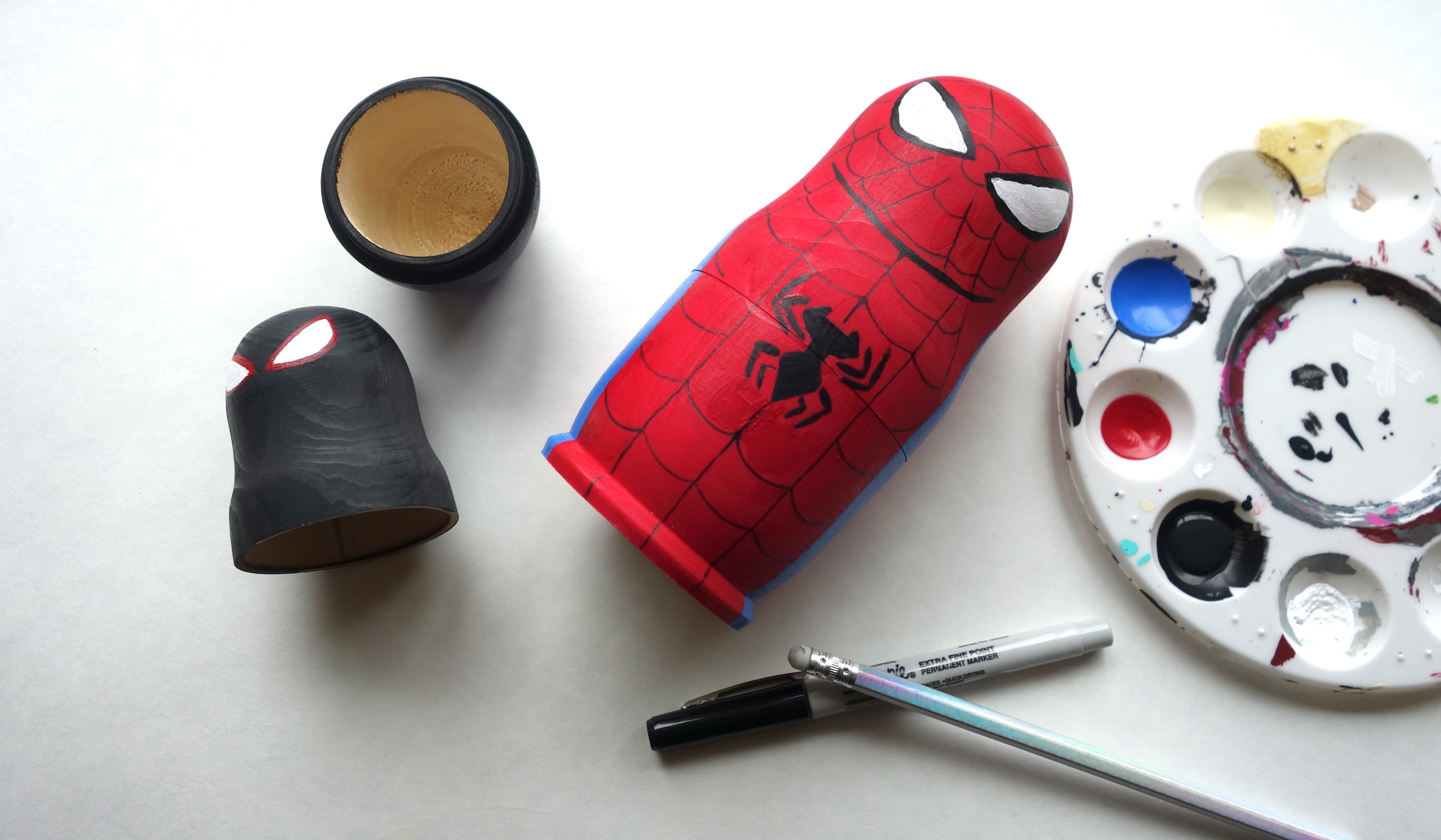 Spider-Geddon Nesting Dolls: Lightly draw the details of the center spider symbol