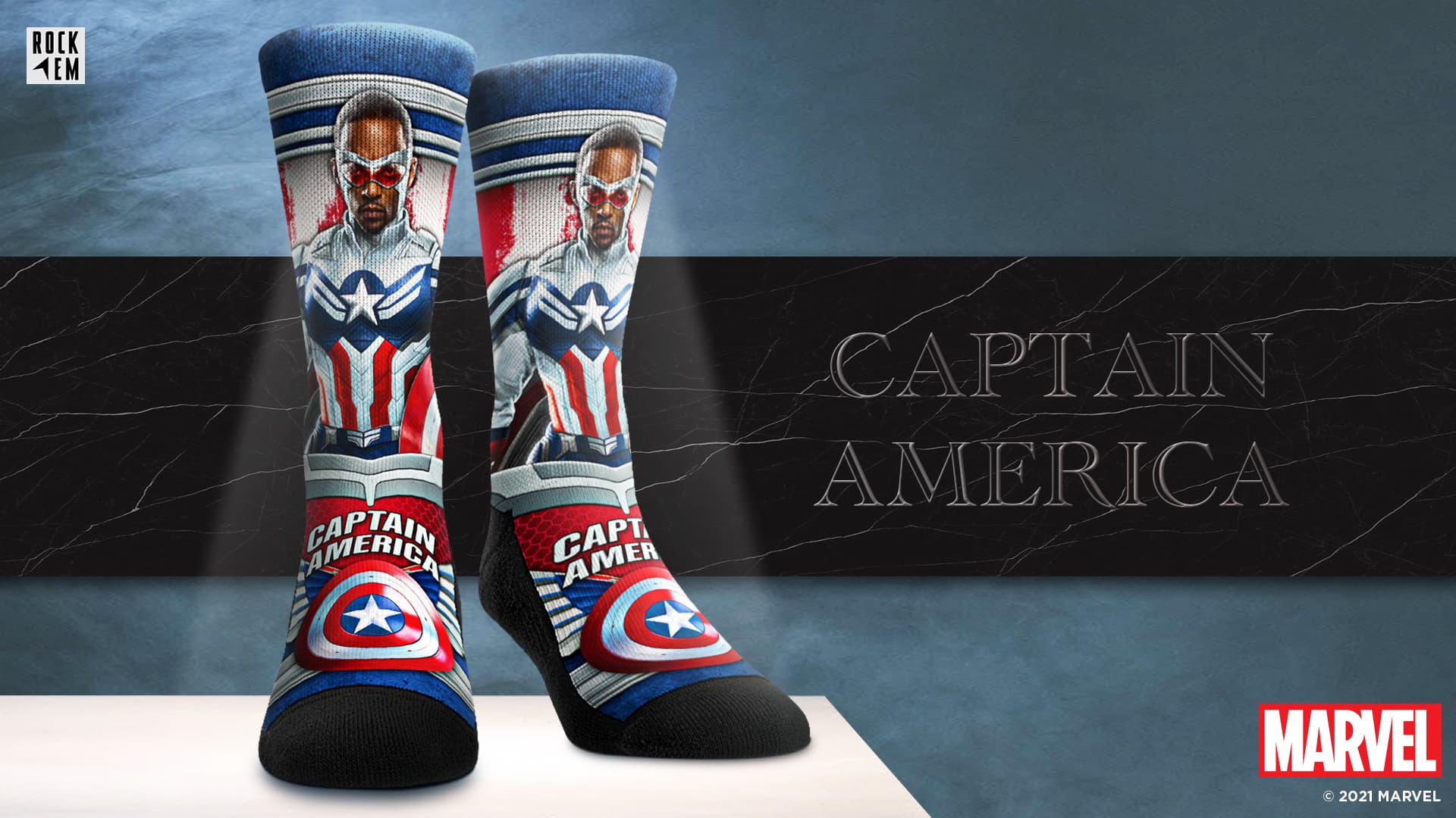 <a href=https://rockemsocks.com/collections/the-falcon-and-the-winter-soldier/products/captain-america-sam-wilson-hero-pose>Captain America: Hero Pose</a> / Rock ‘Em Socks