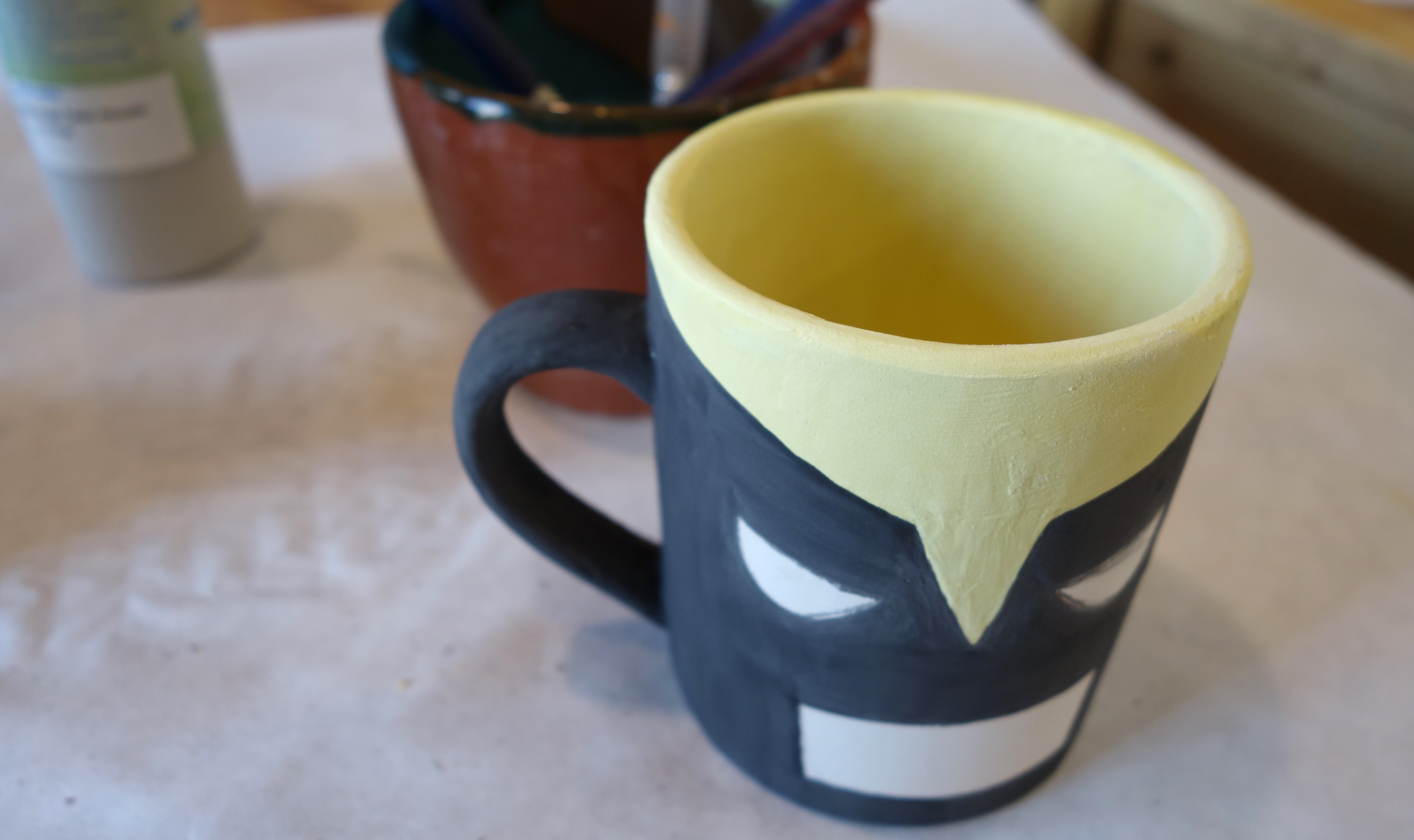 DIY Wolverine Mug Craft - You won’t need to fill in any white paint in the eyes and mouth, but be sure to erase any heavy pencil lines that may still be left.